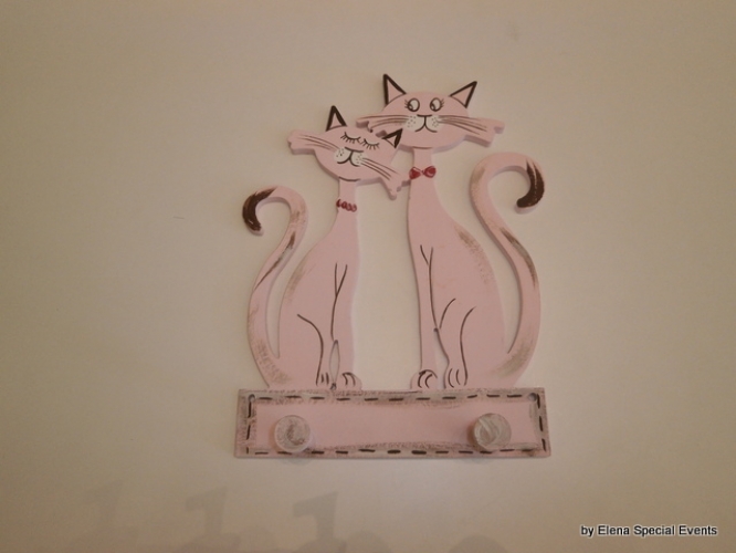 Hand-painted wooden hanger “cats”.