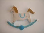 Hand-painted wooden hanger “carousel”.