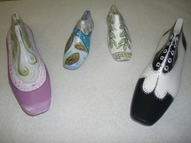 Hand-painted wooden shoe last.